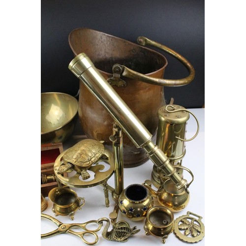 460 - Collection of assorted brass and metal wares to include brass telescope, a copper helmet form coal s... 