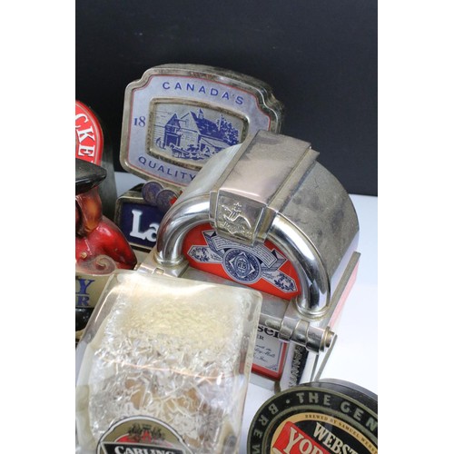 461 - Collection of breweriana beer pump covers to include Budweiser, Woodpecker cider, Dry Blackthorn, Ho... 