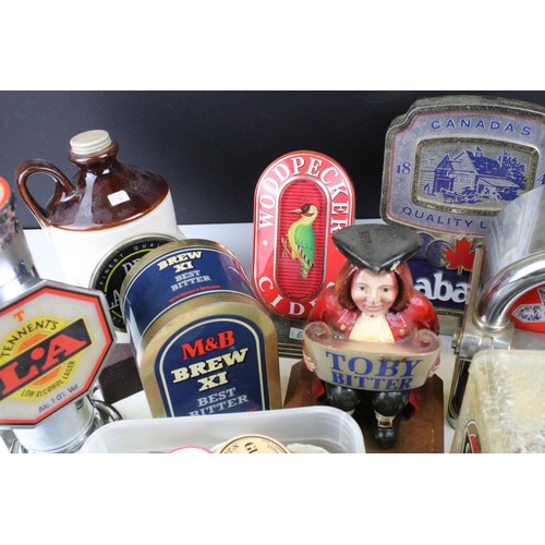 461 - Collection of breweriana beer pump covers to include Budweiser, Woodpecker cider, Dry Blackthorn, Ho... 