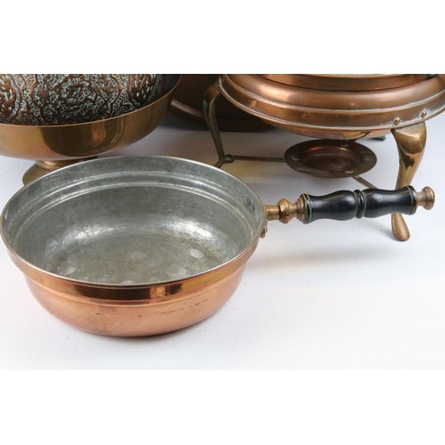 464 - Collection of assorted copper wares to include a Persian copper ewer, twon handled pot with repousse... 