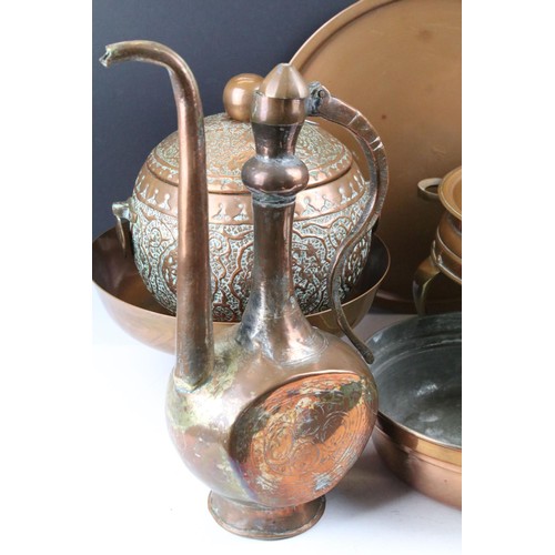 464 - Collection of assorted copper wares to include a Persian copper ewer, twon handled pot with repousse... 