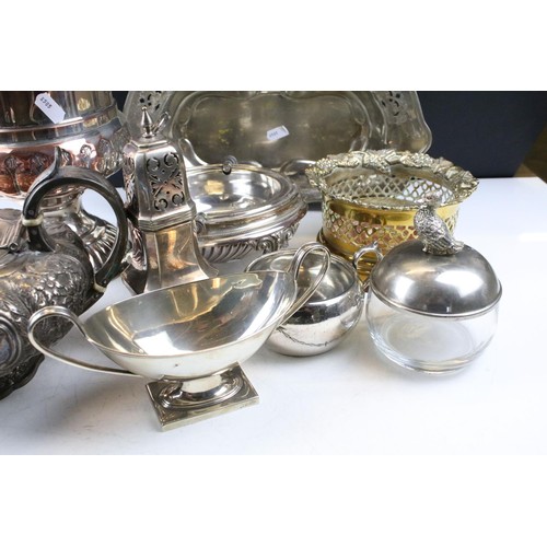 465 - Collection of silver plated to include champagne bucket, muffin warmer, wine coaster, oil lamp, gond... 