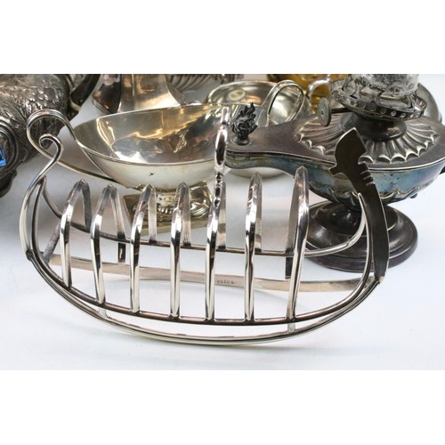 465 - Collection of silver plated to include champagne bucket, muffin warmer, wine coaster, oil lamp, gond... 