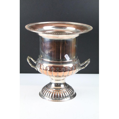 465 - Collection of silver plated to include champagne bucket, muffin warmer, wine coaster, oil lamp, gond... 