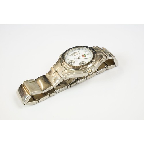 331 - A collection of four watches to include Timex, a Chairman Mau commemorative watch and a watch marked... 