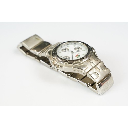 331 - A collection of four watches to include Timex, a Chairman Mau commemorative watch and a watch marked... 