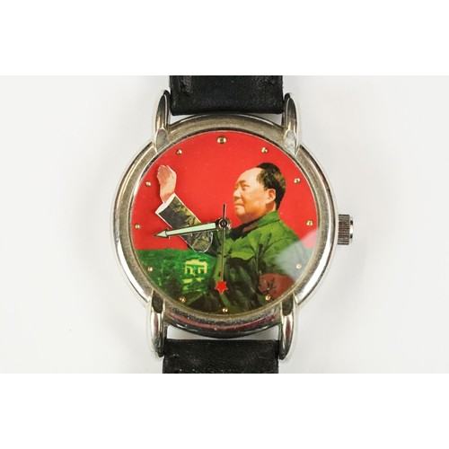 331 - A collection of four watches to include Timex, a Chairman Mau commemorative watch and a watch marked... 