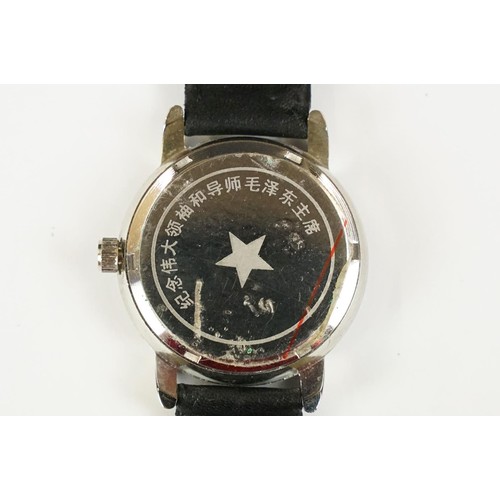 331 - A collection of four watches to include Timex, a Chairman Mau commemorative watch and a watch marked... 