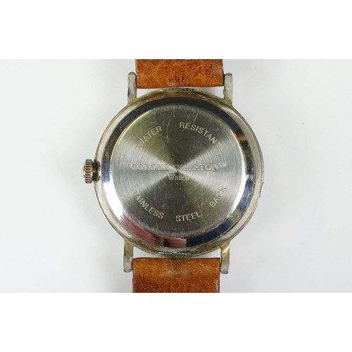 331 - A collection of four watches to include Timex, a Chairman Mau commemorative watch and a watch marked... 