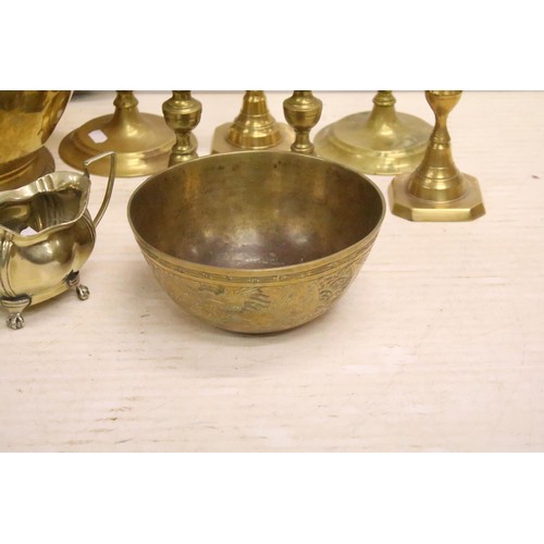 486 - Collection of silver plate and brassware to include: brass jardiniere, three pairs of brass candlest... 
