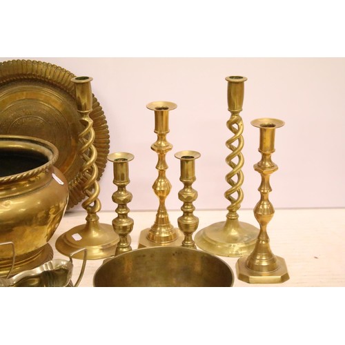 486 - Collection of silver plate and brassware to include: brass jardiniere, three pairs of brass candlest... 