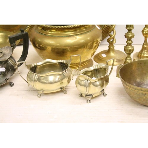 486 - Collection of silver plate and brassware to include: brass jardiniere, three pairs of brass candlest... 