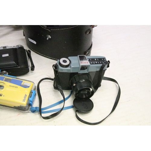 503 - A large collection of cameras contained within two boxes to include Nikon, Fujica and Canon examples... 