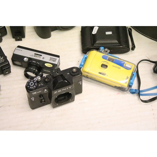 503 - A large collection of cameras contained within two boxes to include Nikon, Fujica and Canon examples... 