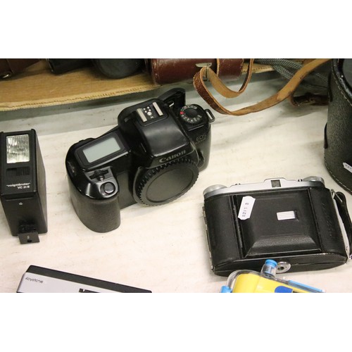 503 - A large collection of cameras contained within two boxes to include Nikon, Fujica and Canon examples... 