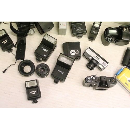 503 - A large collection of cameras contained within two boxes to include Nikon, Fujica and Canon examples... 