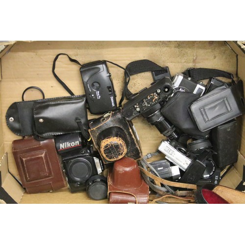 503 - A large collection of cameras contained within two boxes to include Nikon, Fujica and Canon examples... 