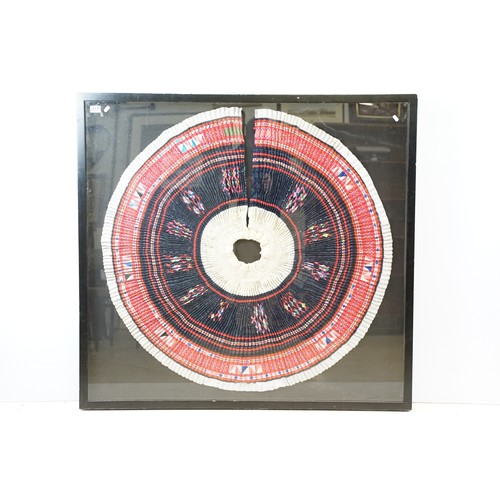 517 - Thai framed hand made tradition Hmong pleated skirt set within a ebonised wooden frame. Measures 127... 