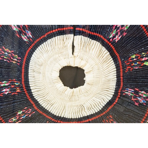 517 - Thai framed hand made tradition Hmong pleated skirt set within a ebonised wooden frame. Measures 127... 