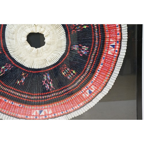 517 - Thai framed hand made tradition Hmong pleated skirt set within a ebonised wooden frame. Measures 127... 