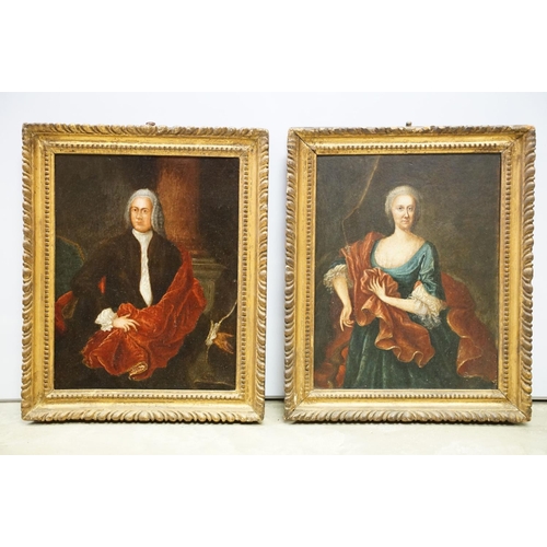 228 - 18th century English School, portrait of a lady and gentleman, each standing 3/4 length, oil on oak ... 