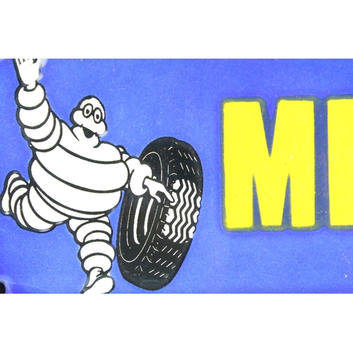 109 - Michelin Man Enamel Sign with Mr Bidendum running with a tyre, 30.5cm x 11cm