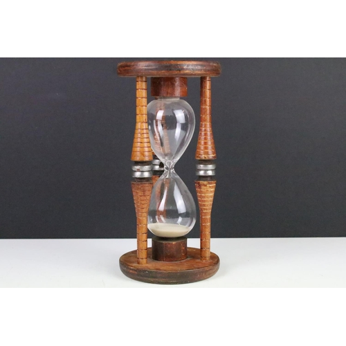 110 - Large Egg timer formed from a 19th century wooden mill bobbin, 27cm high