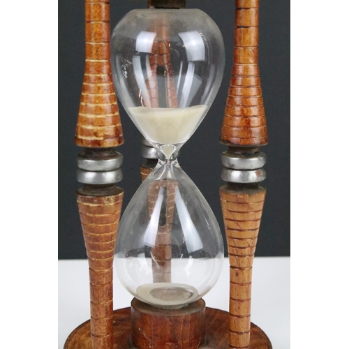 110 - Large Egg timer formed from a 19th century wooden mill bobbin, 27cm high