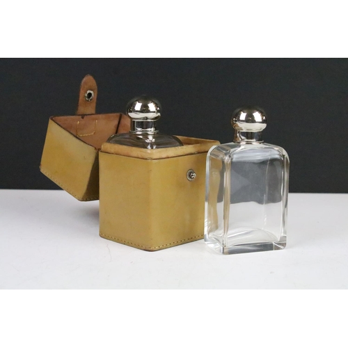 112 - Early 20th century Pair of Glass Bottles and Stoppers with Silver Plate Caps contained within their ... 