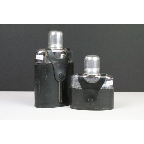 127 - Two leather and glass hip flasks, both with aluminium caps, heights 6.5cm and 10.5cm respectively