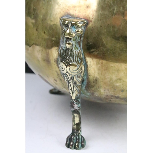 137 - Victorian brass planter raised on three cast lion supports, approx 31cm tall