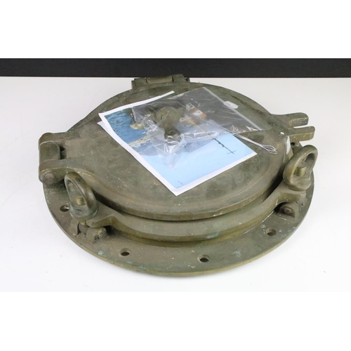 145 - Brass porthole cover from the T H Watermeyer tug vessel, approx 42cm diameter