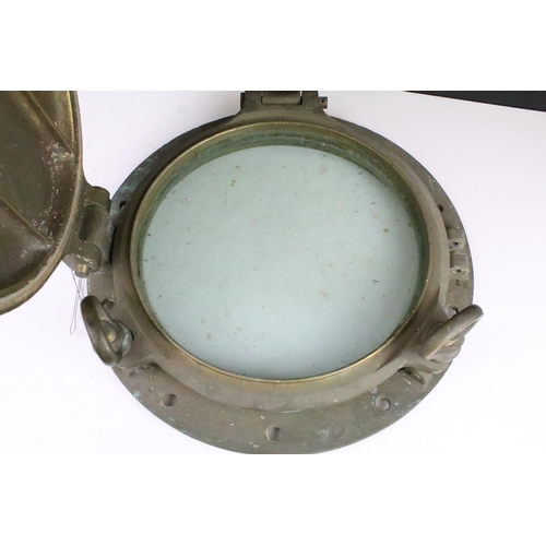 145 - Brass porthole cover from the T H Watermeyer tug vessel, approx 42cm diameter