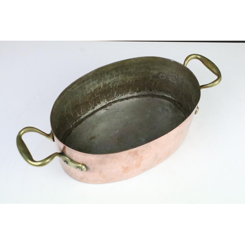 159 - Antique Copper Oval Pan / Planter with brass loop handles, 42cm long