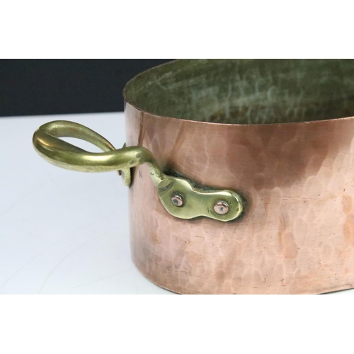 159 - Antique Copper Oval Pan / Planter with brass loop handles, 42cm long