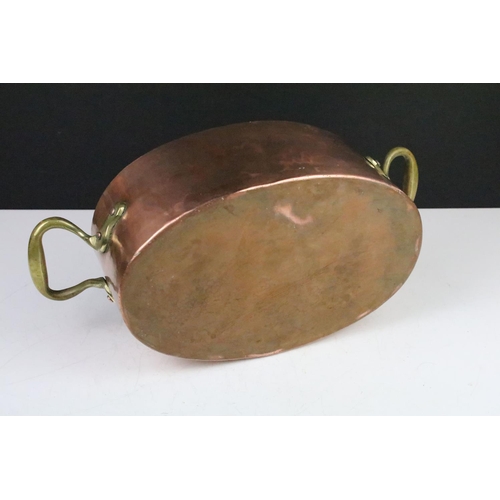 159 - Antique Copper Oval Pan / Planter with brass loop handles, 42cm long