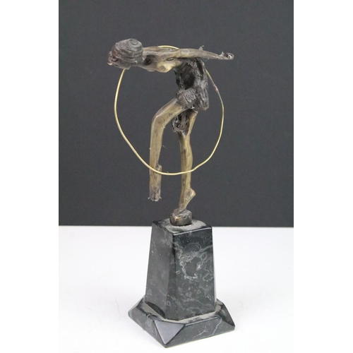 160 - Pair of bronze Art Deco style female performers with hoops, mounted on marble pedestal bases, approx... 