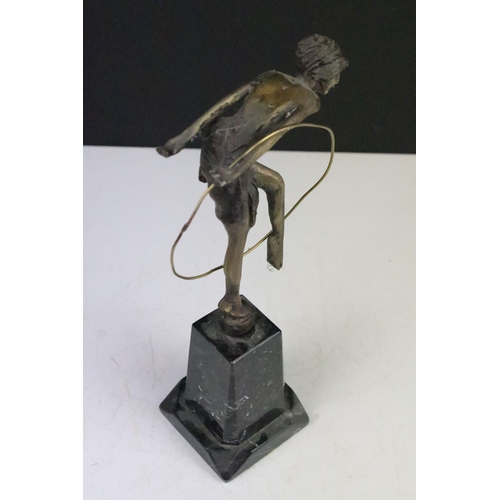 160 - Pair of bronze Art Deco style female performers with hoops, mounted on marble pedestal bases, approx... 