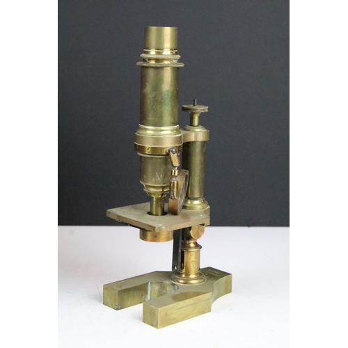 167 - S. Maw, Son & Thompson of London no. 8106 brass microscope raised on a y-shaped foot, approx 25cm ta... 