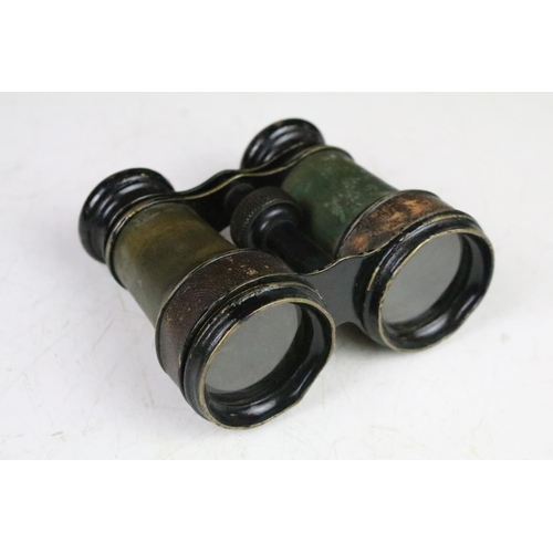 189 - Two pairs of antique binoculars to include a pair of A Tubuet Paris binoculars, a pair of unmarked e... 