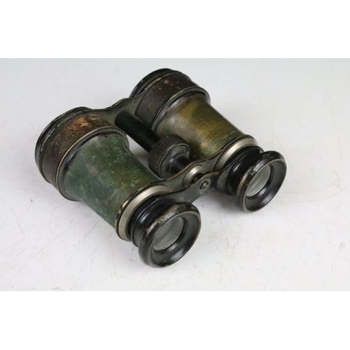 189 - Two pairs of antique binoculars to include a pair of A Tubuet Paris binoculars, a pair of unmarked e... 