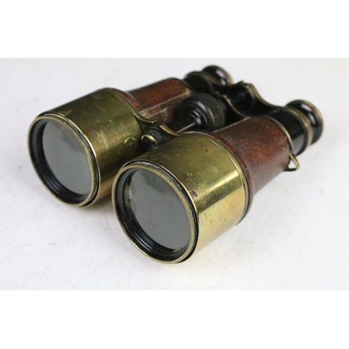 189 - Two pairs of antique binoculars to include a pair of A Tubuet Paris binoculars, a pair of unmarked e... 