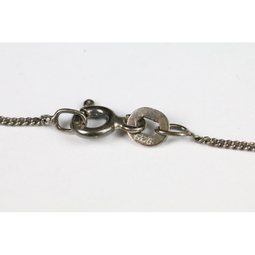 199 - Silver Pendant in the form of a Chinese Dragon on a Silver Chain