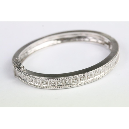 212 - Diamond bangle mounted on 18ct white gold