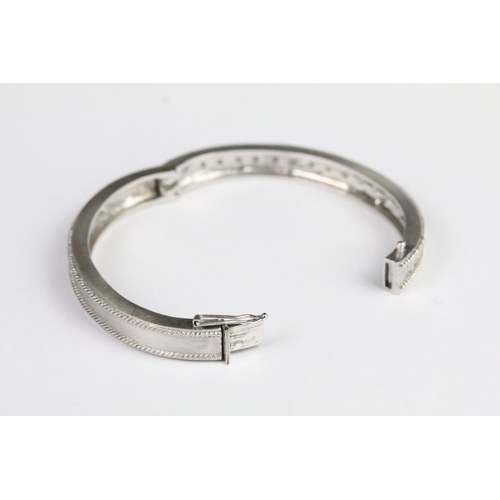 212 - Diamond bangle mounted on 18ct white gold