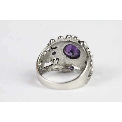 215 - Silver ring, with purple stones, stamped S925