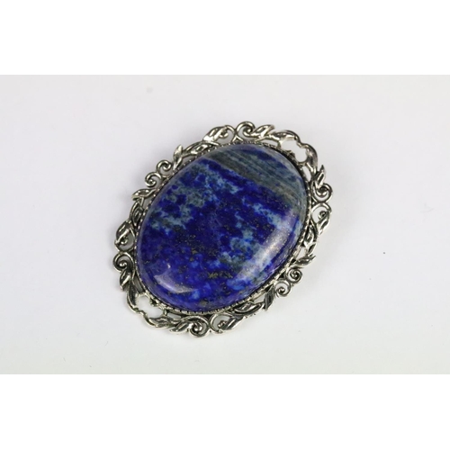 222 - Lapis lazuli jewellery suite to include brooch, panel bracelet and ring. Ring size Q.5. Brooch measu... 