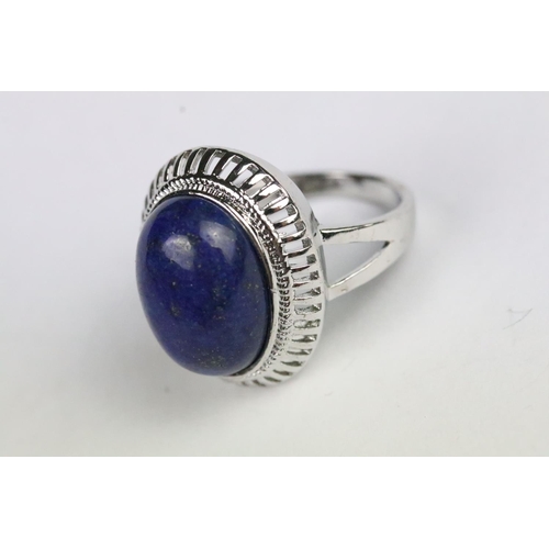 222 - Lapis lazuli jewellery suite to include brooch, panel bracelet and ring. Ring size Q.5. Brooch measu... 