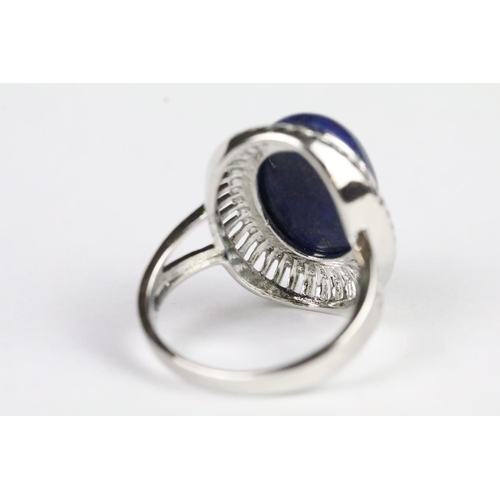 222 - Lapis lazuli jewellery suite to include brooch, panel bracelet and ring. Ring size Q.5. Brooch measu... 