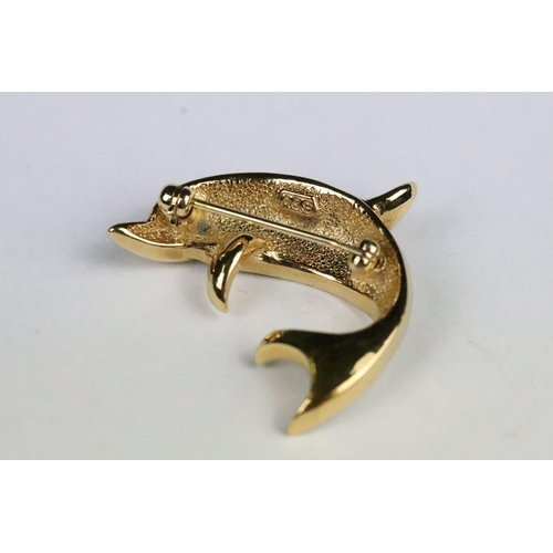 231 - Gilt and enamel dolphin brooch